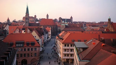 Time Lapse Aerial View of Nuremberg City Skyline People on Street Dusk to Night Stock Footage 104497359