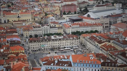 Time Lapse Aerial View of Old Town in Lisbon Urban Transport in Fig Tree Square Stock-Footage 99321980