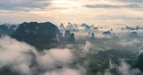 Time lapse of aerial view of river and karst mountains Stock Footage 98012576