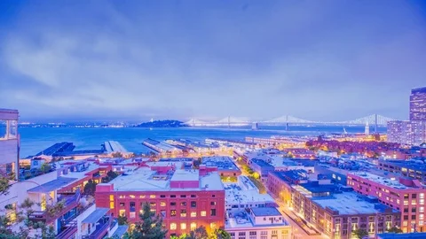 Time Lapse - Aerial View of San Francisco Night With Bay Bridge - 4K Stock Footage 79174019