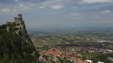 Time Lapse Aerial View of San Marino Old Town and Guaita Tower Castle Landmark Stock Footage 102962802