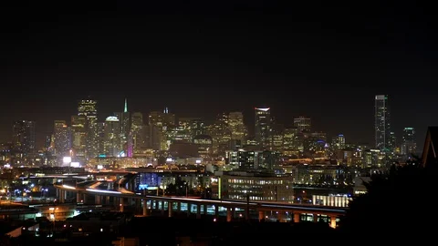 Time Lapse Aerial View of San Francisco Skyline Cars Traffic on Freeway Evening Stock Footage 109283353