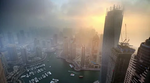 Time lapse aerial view skyscraper foggy weather Dubai Marina Stock Footage 45773736