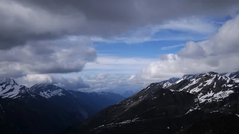 Time Lapse Aerial View of Snow Covered Beautiful Mountains Swiss Alps Winter Day Stock Footage 99042409