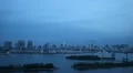 Time Lapse Aerial View of Tokyo Skyline with Rainbow Bridge in Dusk Light Japan HD Footage