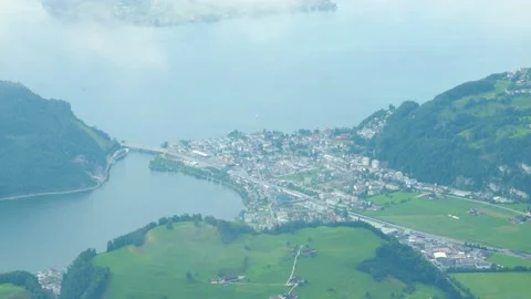 Time Lapse aerial view of town surrounded by lake and mountains. Lake Lucerne Video stock 152525441