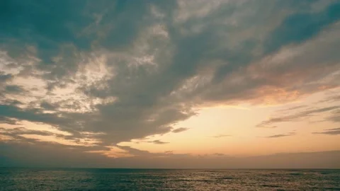 Time lapse After sunset the cloud on sky moving over the ocean Video stock 153591311