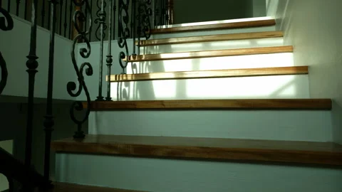 Time lapse of afternoon shadows moving across a staircase Stock Footage 153611729