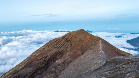 Time-lapse on The Agung Volcano. Clouds move against the background of the 스톡 동영상 235586677