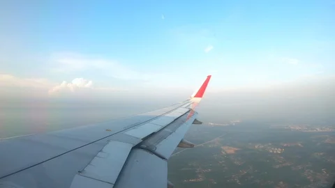 Time Lapse Of Airplane Landing Down From Airplane Windows.4K Stock Footage 125633701