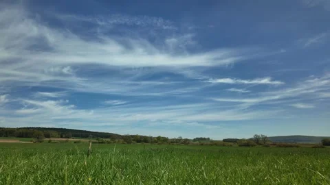 Time lapse of airplanes with long contrails moving among cirrus clouds Stock Footage 344809913