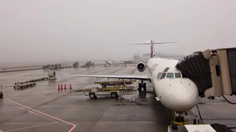 Time lapse airplanes setting up on a rainy airport Stock Footage 47177399