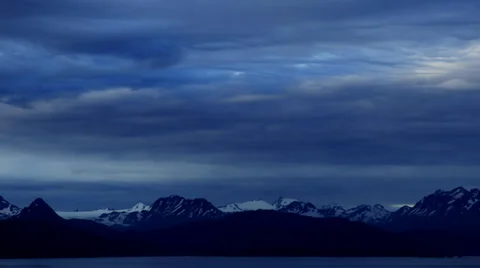 Time lapse: Alaskan mountains and glacier at dusk Stock Footage 39817094