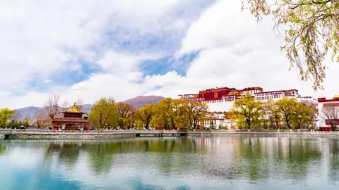 Time Lapse of All Day Lake Scenery Flowing Cloud Yellow Trees Potala Palace Stock Footage 337944968