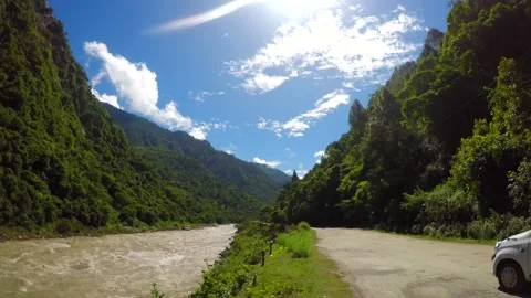 Time lapse along with river and road in mountains uttrakhand Stock Footage 220414222
