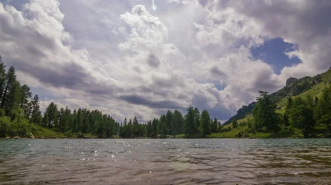 Time lapse of an Alpine panorama with lake and clouds Stock Footage 52512352