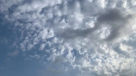 Time lapse of altocumulus clouds fading Stock Footage 128850026