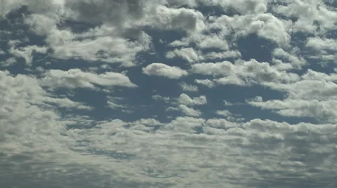 Time Lapse of Altocumulus Clouds Marchcng Across Sky Stock Footage 54736386