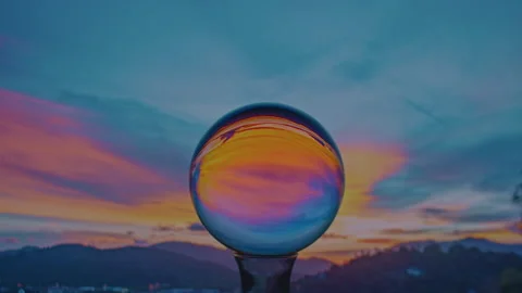 Time lapse Amazing view of beautiful sky at sunset inside crystal ball.. 스톡 동영상 313726583