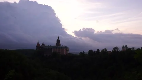 Time-lapse with amazing view on castle in the forest and evening sky with sunset Stock Footage 137221851