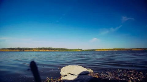 Time lapse and panning at the river's shore Stock Footage 8690993