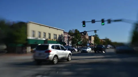 Time Lapse and Tilt Shift Shot of Cars Driving in Small Town Stock Footage 58015783