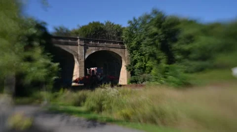 Time Lapse and Tilt Shift Shot of Railroad Trestle and Maintenance Vehicles Stock Footage 58016301
