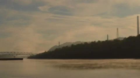 Time Lapse and Tilt Shift Shot of Barge coming up the Ohio River Stock Footage 58016321