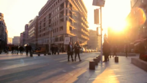 Time lapse anonymous pedestrians crossing the street on a golden sunset Stock Footage 83528201