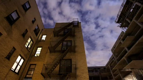 Time lapse of apartment building at night  Stock Footage