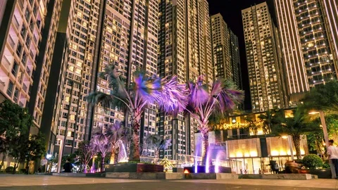 Time lapse of apartment building at night 스톡 동영상 100740593
