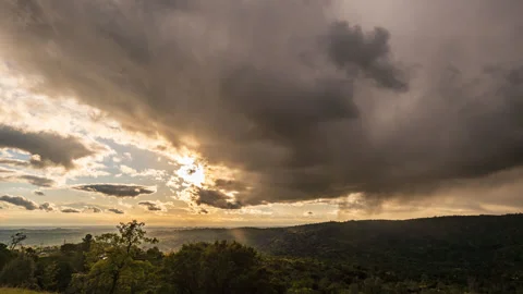 Time Lapse as an Approaching Rainstrorm brings Rain Drops to Camera Lens Stock Footage 278357868