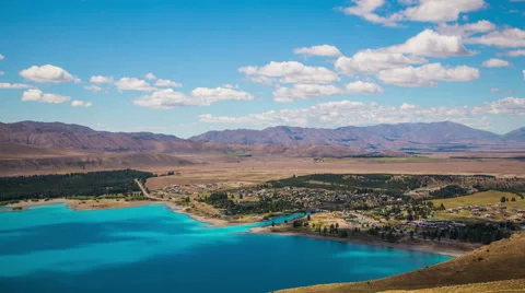 Time Lapse - Ariel View of Lake Tekapo with Mountain Range, New Zealand Stock Footage 58630225