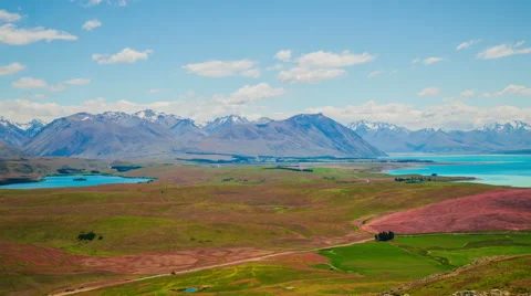 Time Lapse - Ariel View Lake Tekapo with Mountain Range and Beautiful Clouds Stock Footage 60969175