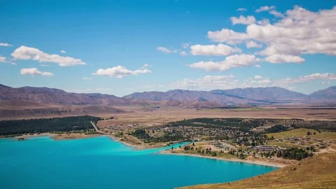 Time Lapse - Ariel View of Lake Tekapo with Mountain Range Stock Footage 72753883