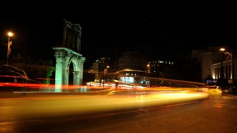Time Lapse of Athens City with Arch of Hadrian Famous Landmark Car Traffic Night Stock Footage 98870700