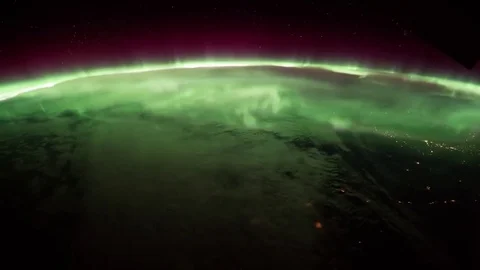 Time lapse of Aurora Borealis as the ISS travels pass Pacific Ocean Stock Footage 80794424