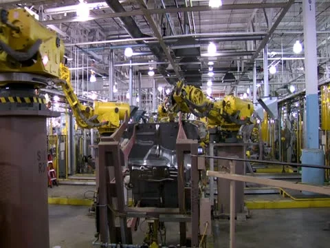 Time-lapse Automotive Robotic Arms Automation Welding Assembly Line Automotive Stock Footage