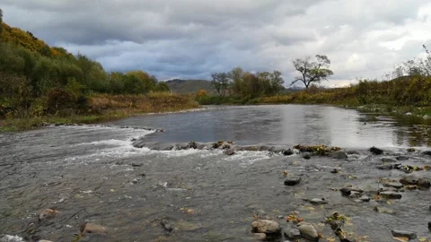 Time lapse of autumn landscape with a river in the mountains Stock Footage 253747050