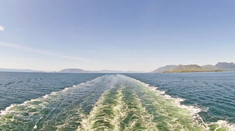Time-lapse from the back of a cruise ship entering a channel in Alaska. Stock Footage 52216879