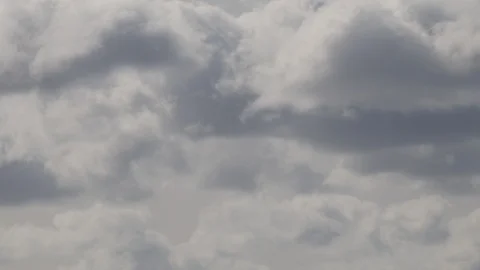 Time-lapse of backlit summer clouds moving through the sky in South Australia Stock Footage 123282162