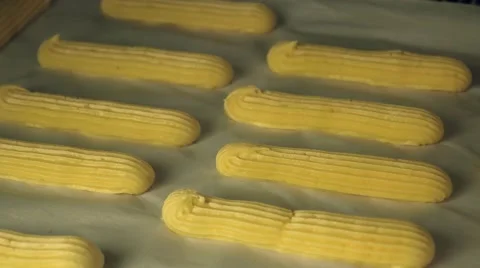 Time lapse of baking choux dough, French traditional Eclairs Stock Footage 63853409