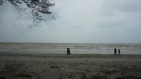 Time lapse of Beach with mans walk around. Stock Footage 33833656