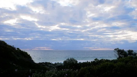 Time lapse beach ocean sunset clouds Vídeo Stock 116098300