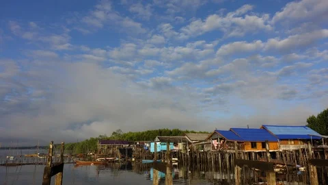 Time lapse : Beautiful Blue sky and cloud at the fisherman village in Phang Nga, Stock-Footage 99169499