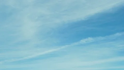 Time Lapse Beautiful Clear Blue Sky and White Cirrus Clouds on Sunny Day, Slow M Stock Footage 221080482