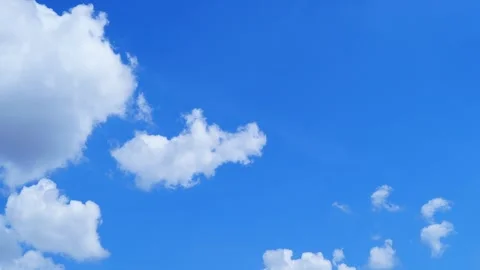 Time Lapse of Beautiful clear blue sky white clouds and puffy fluffy Stock Footage 260286720