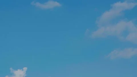 Time Lapse of Beautiful clear blue sky white clouds Stock Footage 282567334
