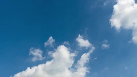 Time Lapse of Beautiful clear blue sky white clouds Stock Footage 325857306
