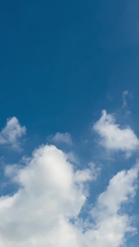 Time Lapse of Beautiful clear blue sky white clouds Stock Footage 325857420
